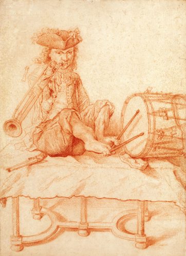A Disabled Musician seated on a Table, playing a Trumpet, and holding Drumsticks with his Feet